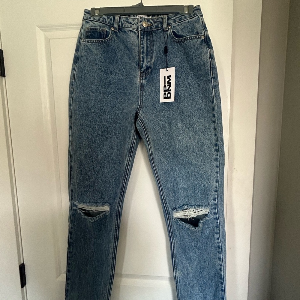 Woman's Blue Distressed Jeans